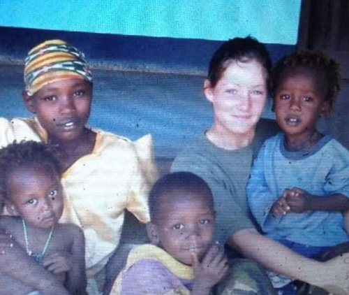 Amber on tour in Kenya with local children