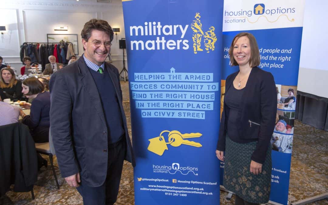 Veterans foundation ceo posing with member of charity